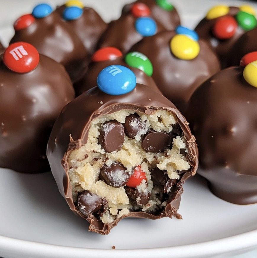 M&M Christmas cookie dough truffles coated in chocolate