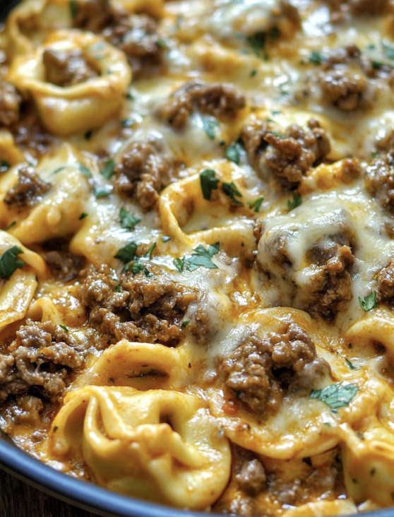 Creamy cheesesteak tortellini skillet with melty provolone